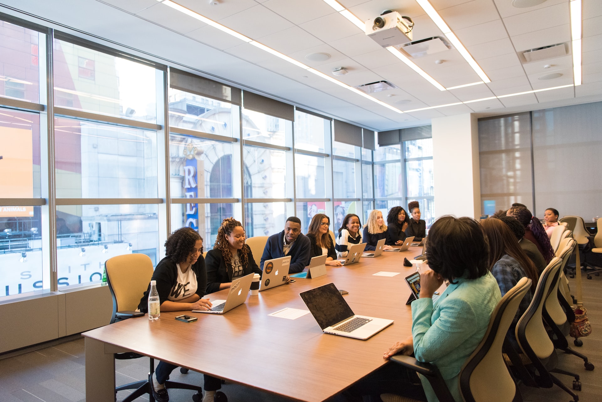 Diverse group of people meeting about how to break bias