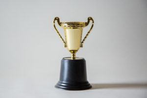 Giving recognition to an employee with a trophy